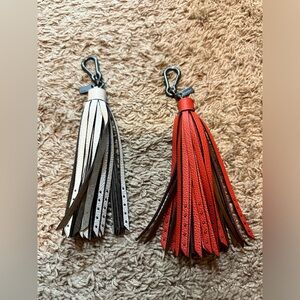 Coach leather tassels.